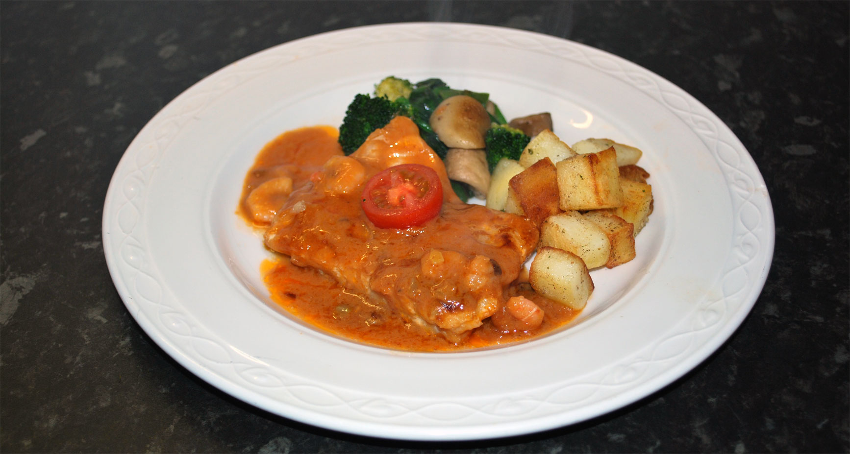 Fillet of Cod  in Seafood Sauce with Prawns